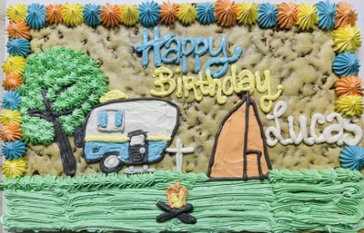 Camping-themed cookie cake