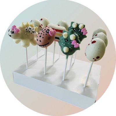 Pastel dinosaur cake pops